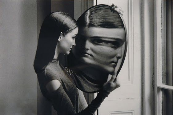 teen looking at the mirror