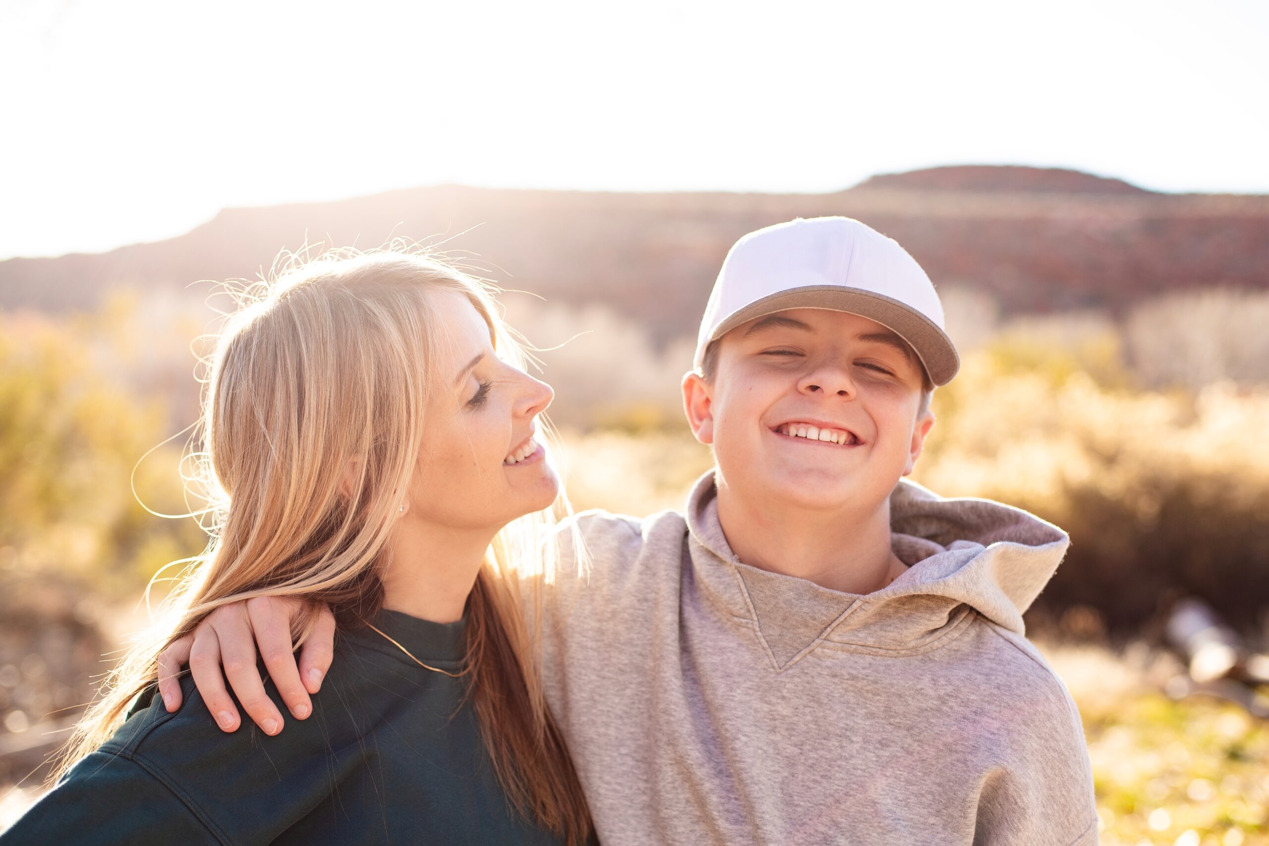 Mother,Playing,With,Her,Cute,Teenage,Son.,Having,A,Happy