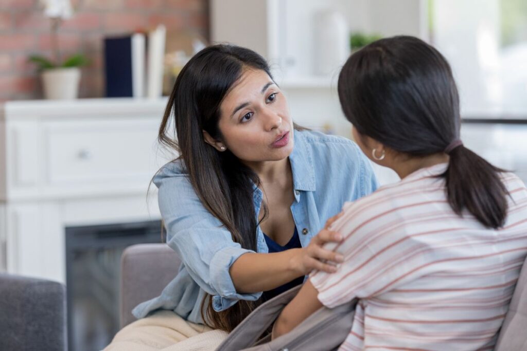 parent talking to teen about trauma