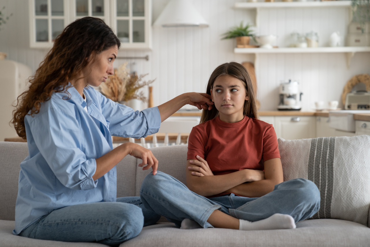 mother speaking to her daughter about are teen curfews good for mental health