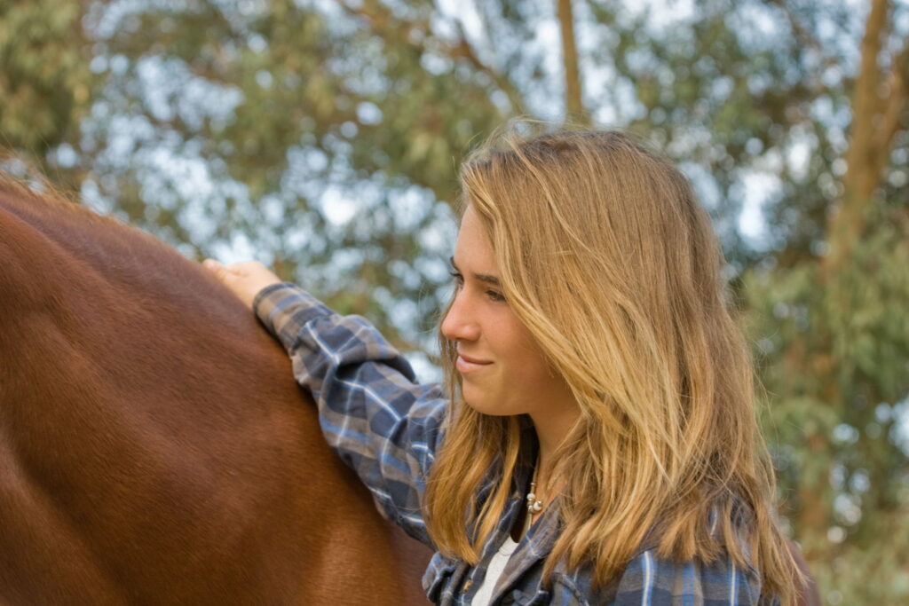 teen in equine therapy program