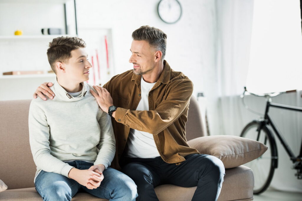 parent with his teenage son