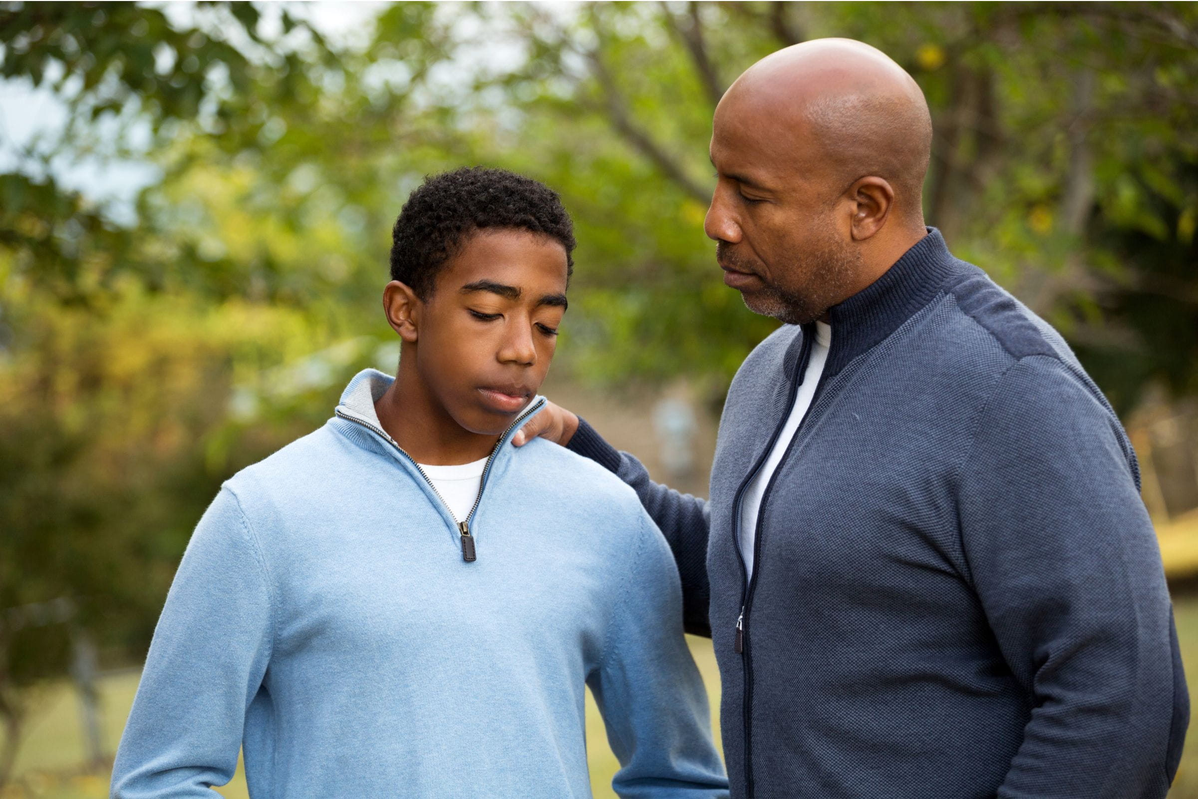 parent talks to teen refusing behavioral health treatment