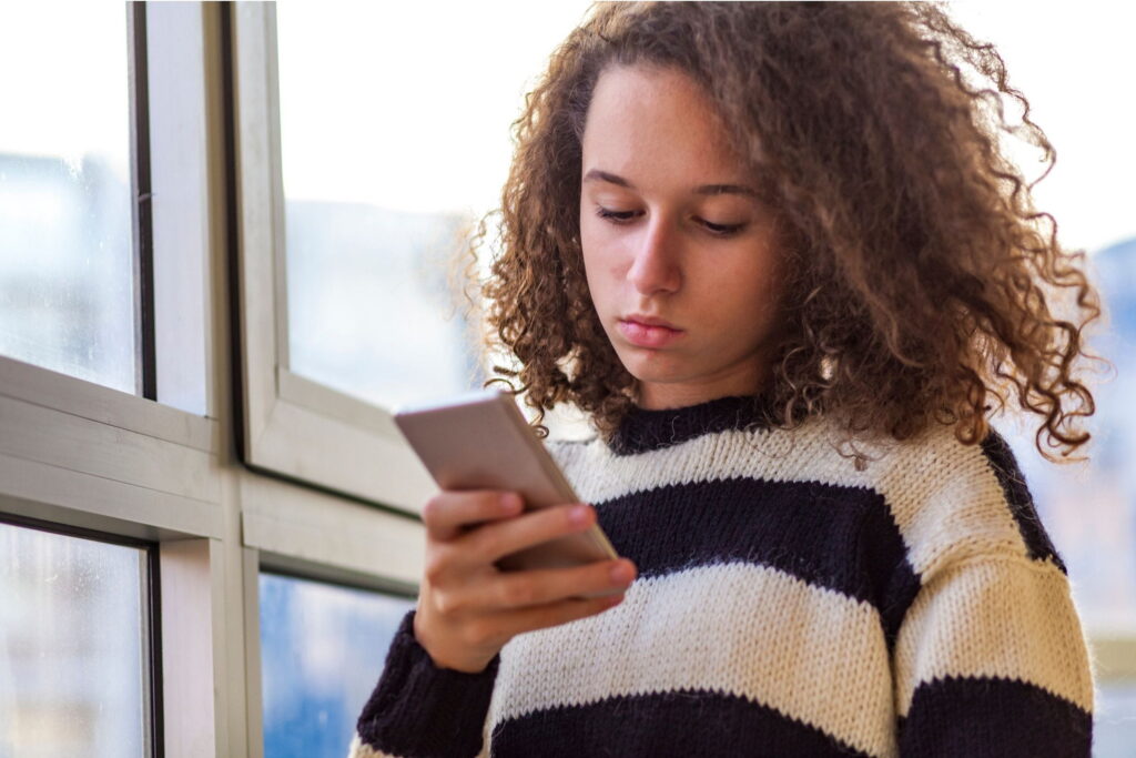 teen using cell phone may be too reliant on technology