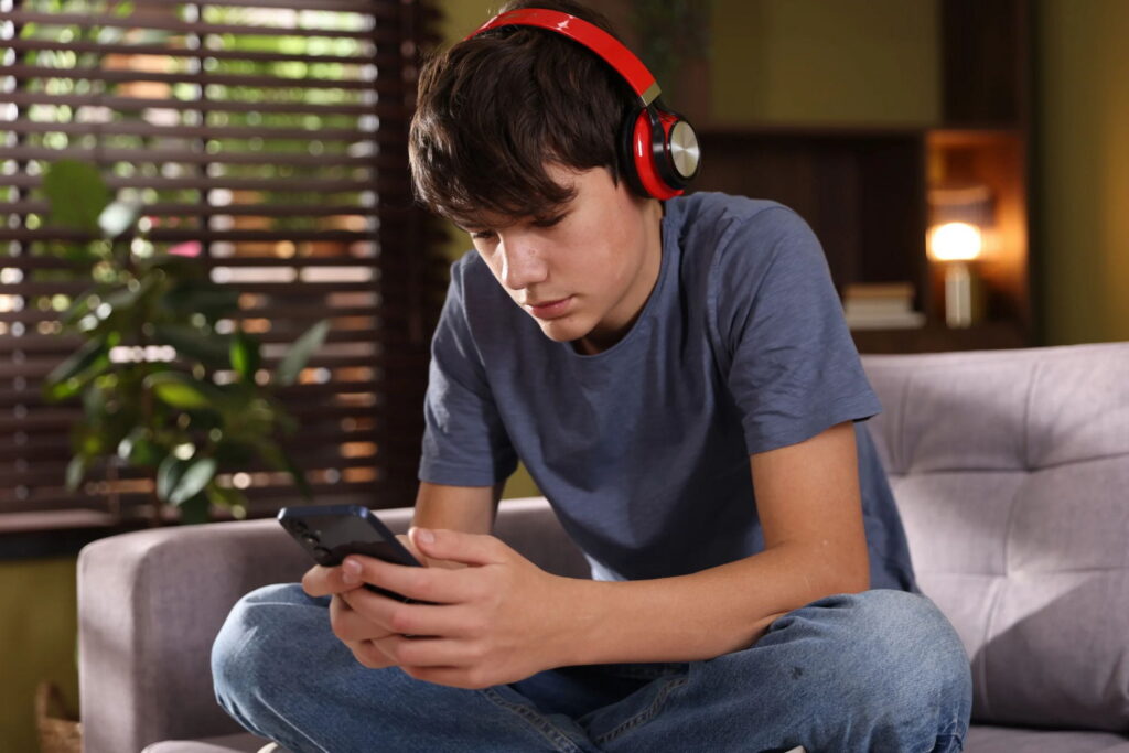 teen with sensory issues uses headphones